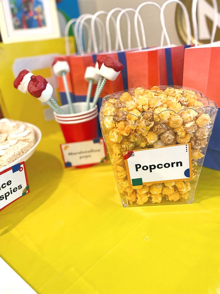 I made food place cards using Canva for Mario themed party 